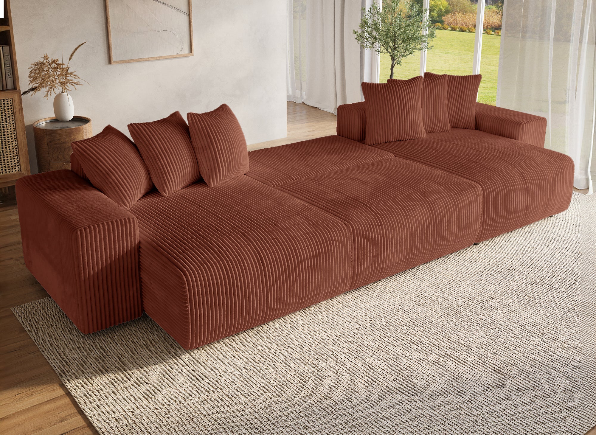 Sofá cama panorámico reversible NOELIA con almacenaje en pana gruesa color terracota