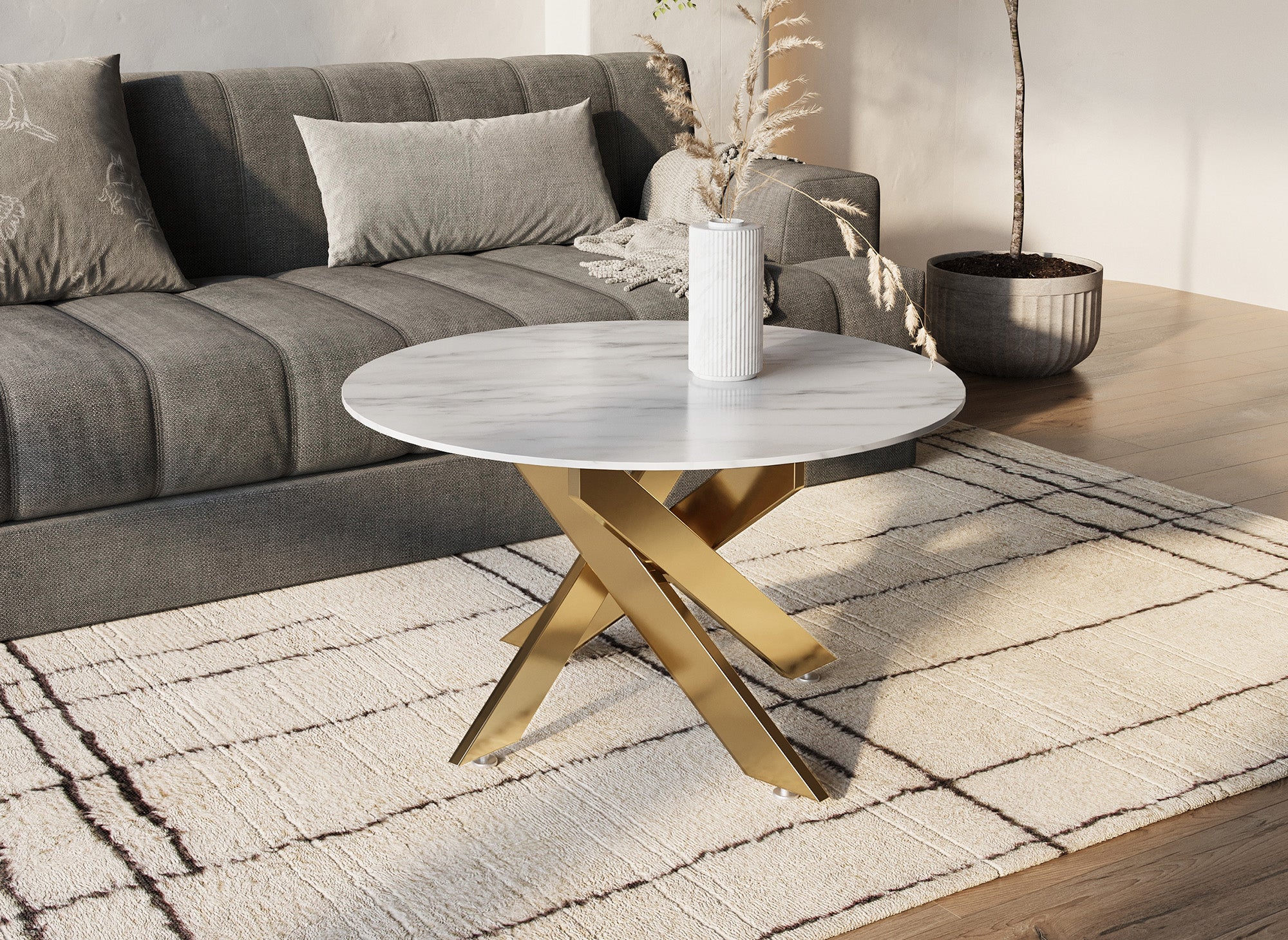 Mesa de centro redonda de diseño MELISSA con cristal marmolado y patas doradas