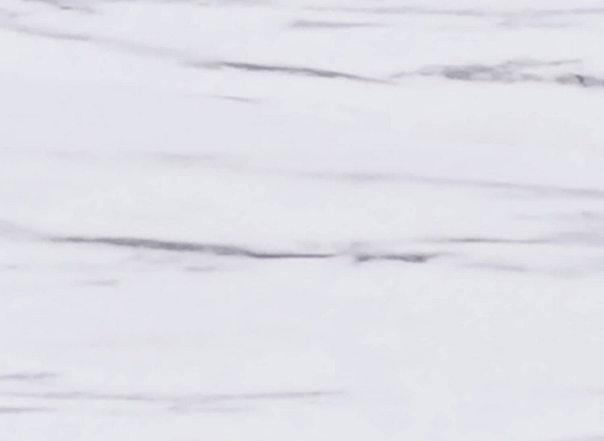 Mesa de centro redonda de diseño MELISSA con cristal marmolado y patas doradas