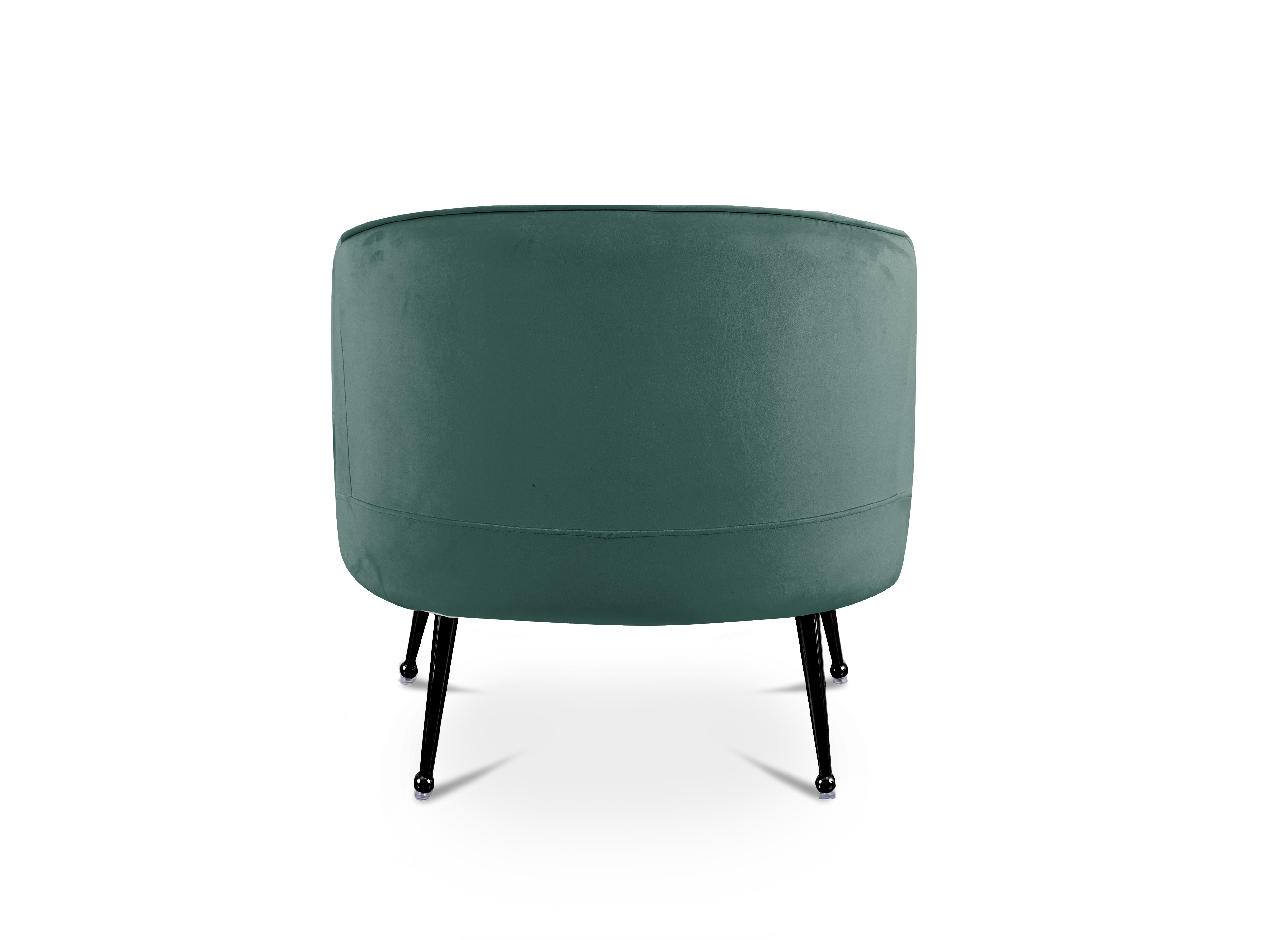 Sillón convertible Trecy en terciopelo verde claro con patas negras