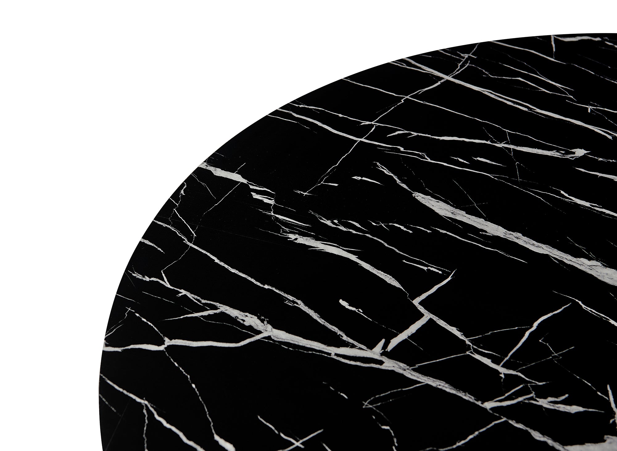 Mesa de comedor redonda Stella con efecto mármol negro y base de metal negro.