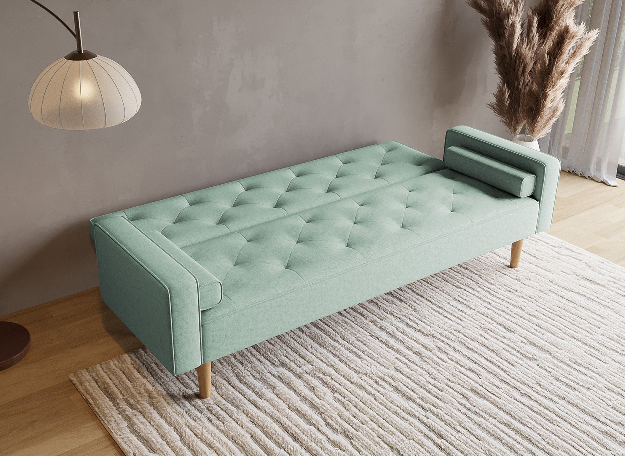 Sofá JAKARTA click-clack tapizado en tela color verde azulado con patas de madera