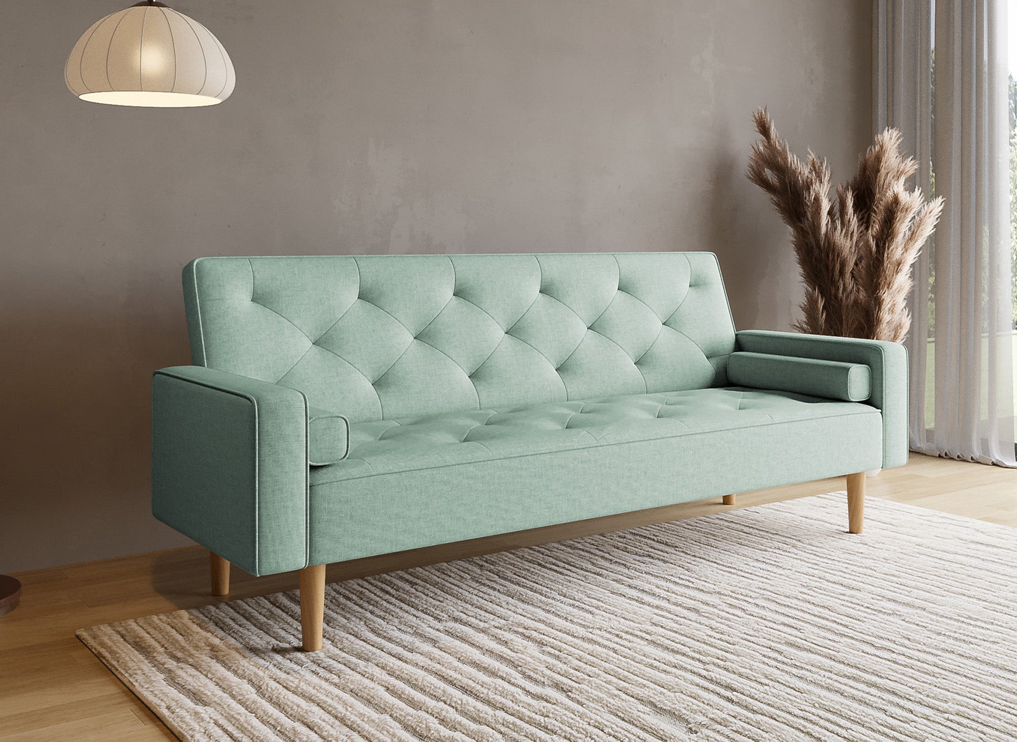 Sofá JAKARTA click-clack tapizado en tela color verde azulado con patas de madera