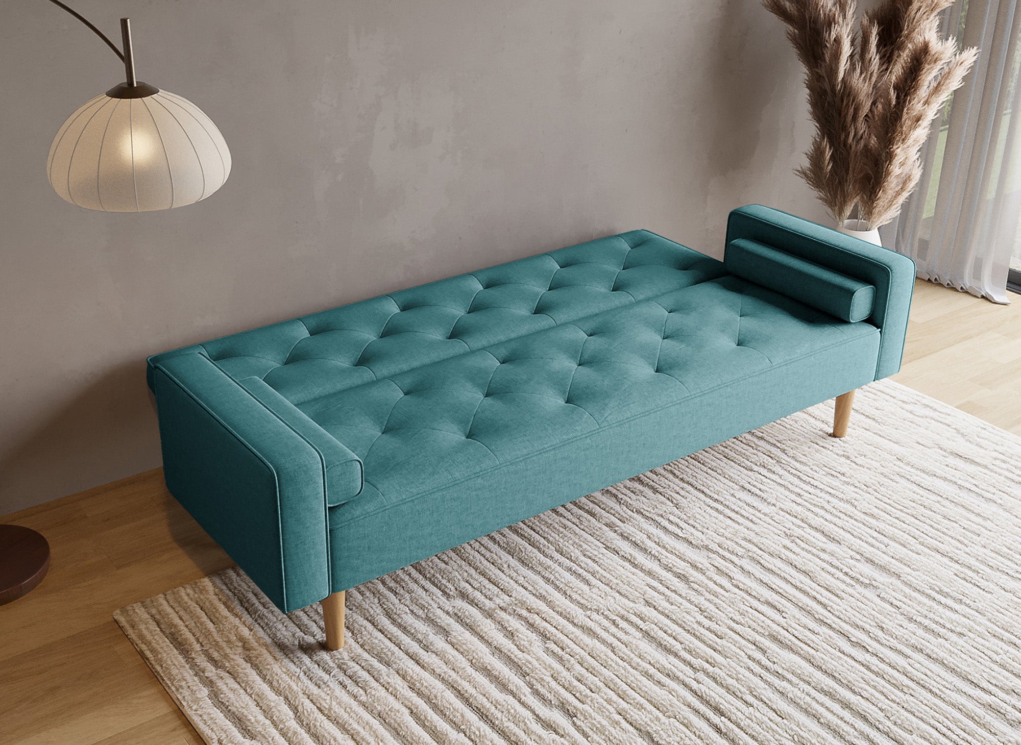 Sofá JAKARTA azul tapizado con mecanismo clic-clac y patas de madera