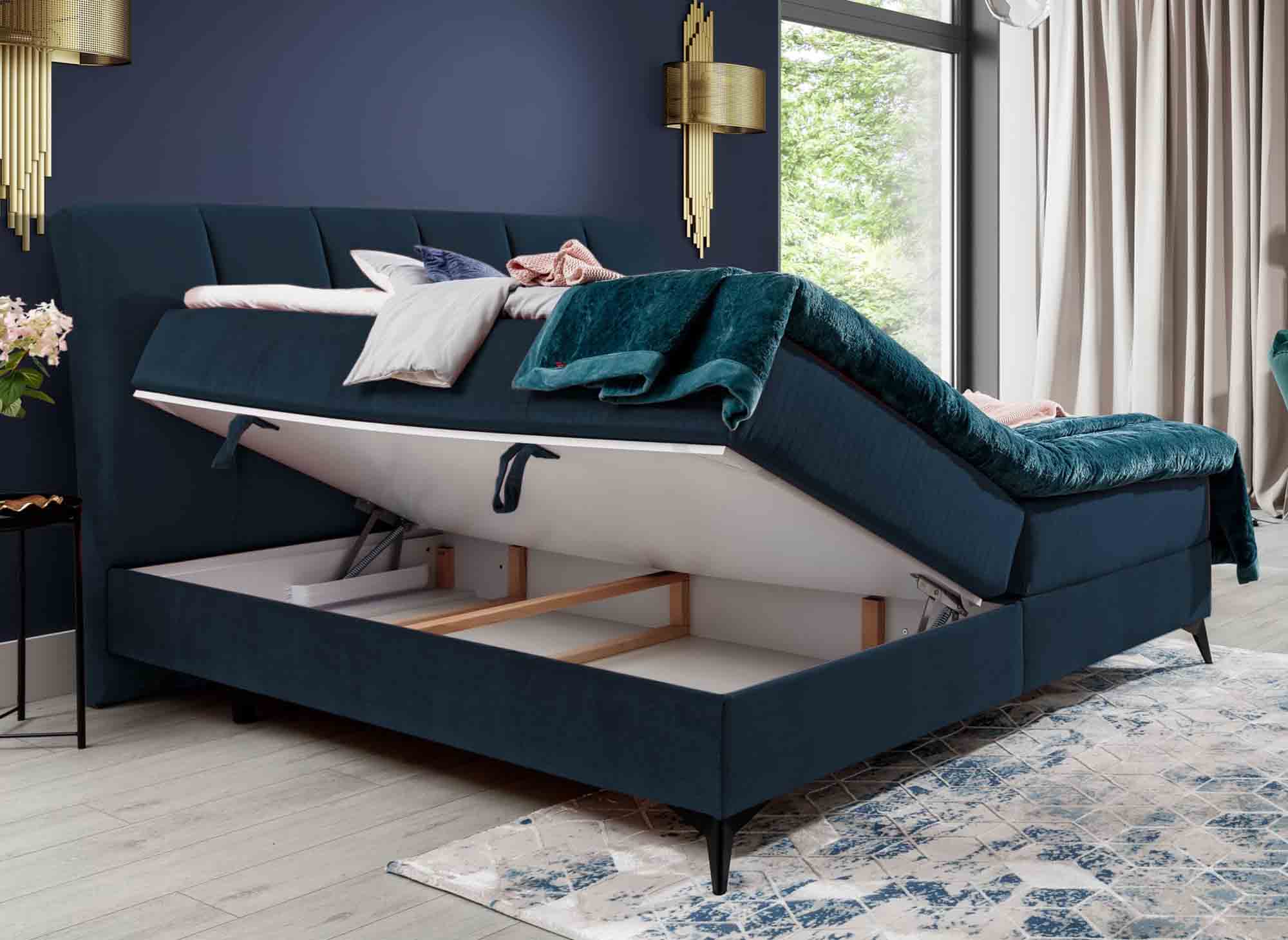 Cama con somier ADELE de 160x200 con compartimento de almacenaje en terciopelo azul oscuro