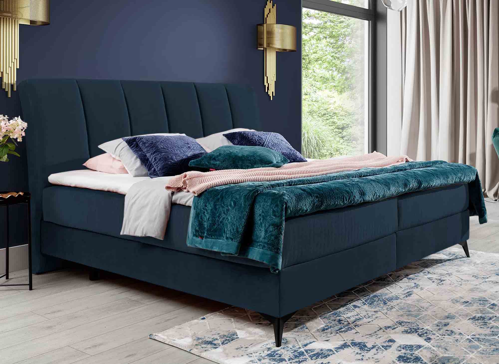 Cama con somier ADELE de 160x200 con compartimento de almacenaje en terciopelo azul oscuro