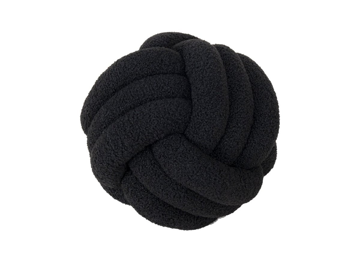Coussin rond décoratif boule de nœud en effet peau de mouton noir NODUS - DécoInParis